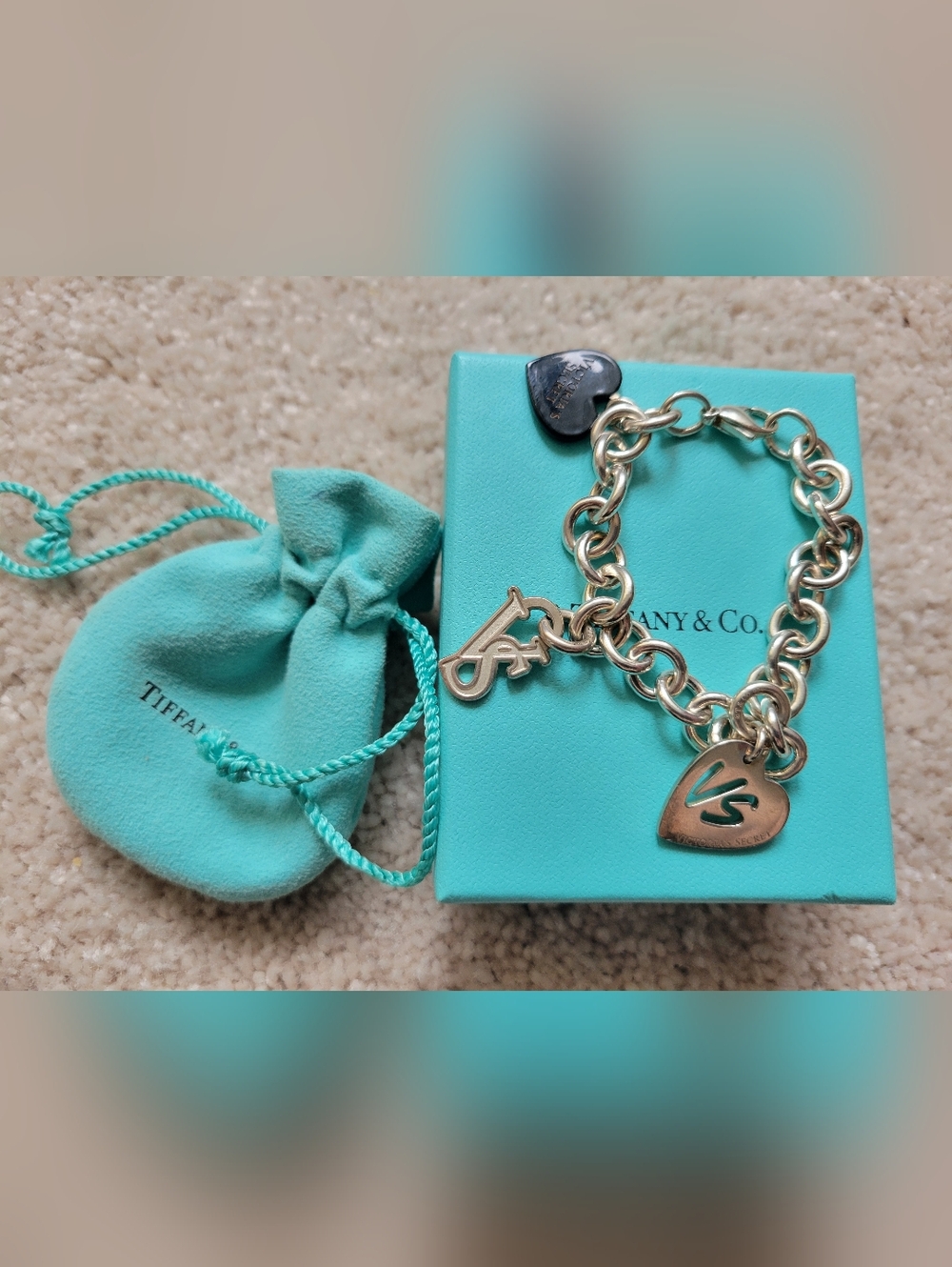 Tiffany & Co. Silver Charm Bracelet with Tiffany Blue Pouch